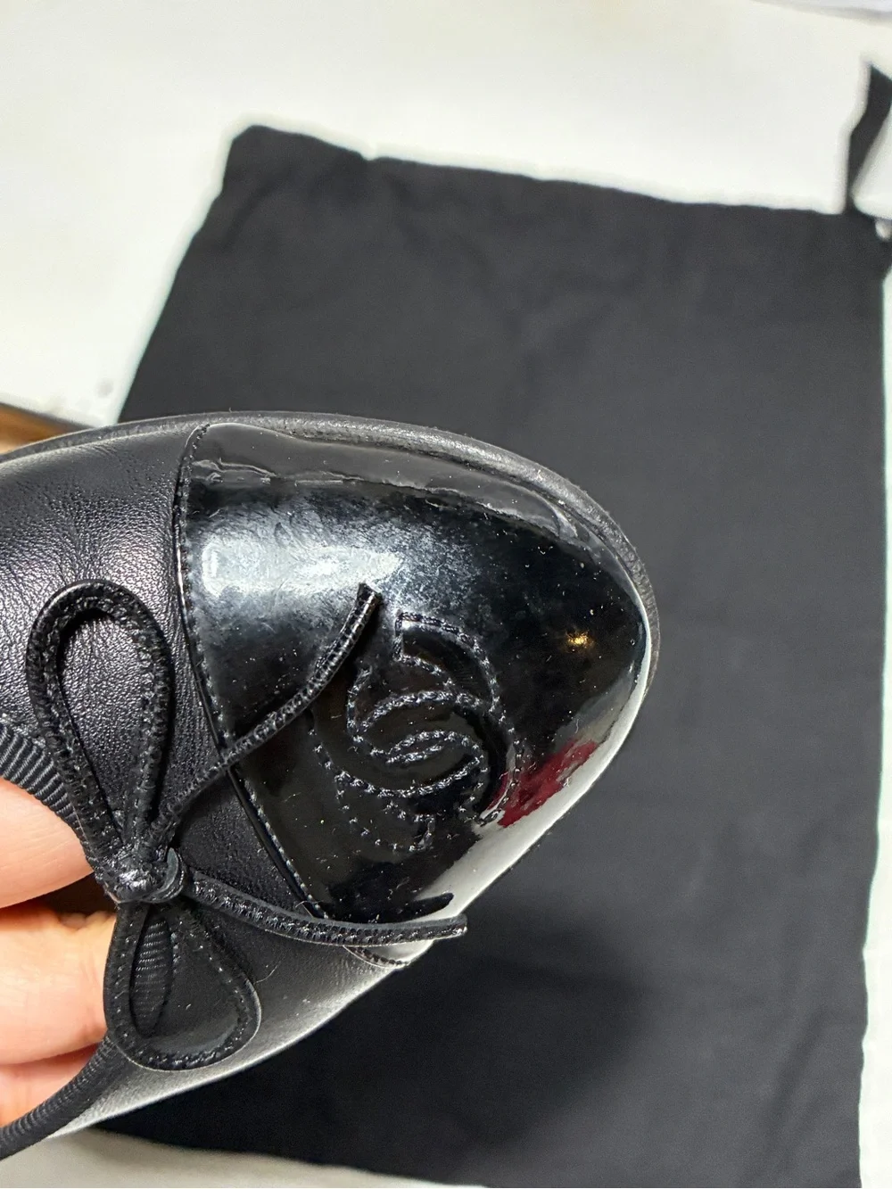 CHANEL Black Leather Cap-Toe Ballet Flats with CC Logo